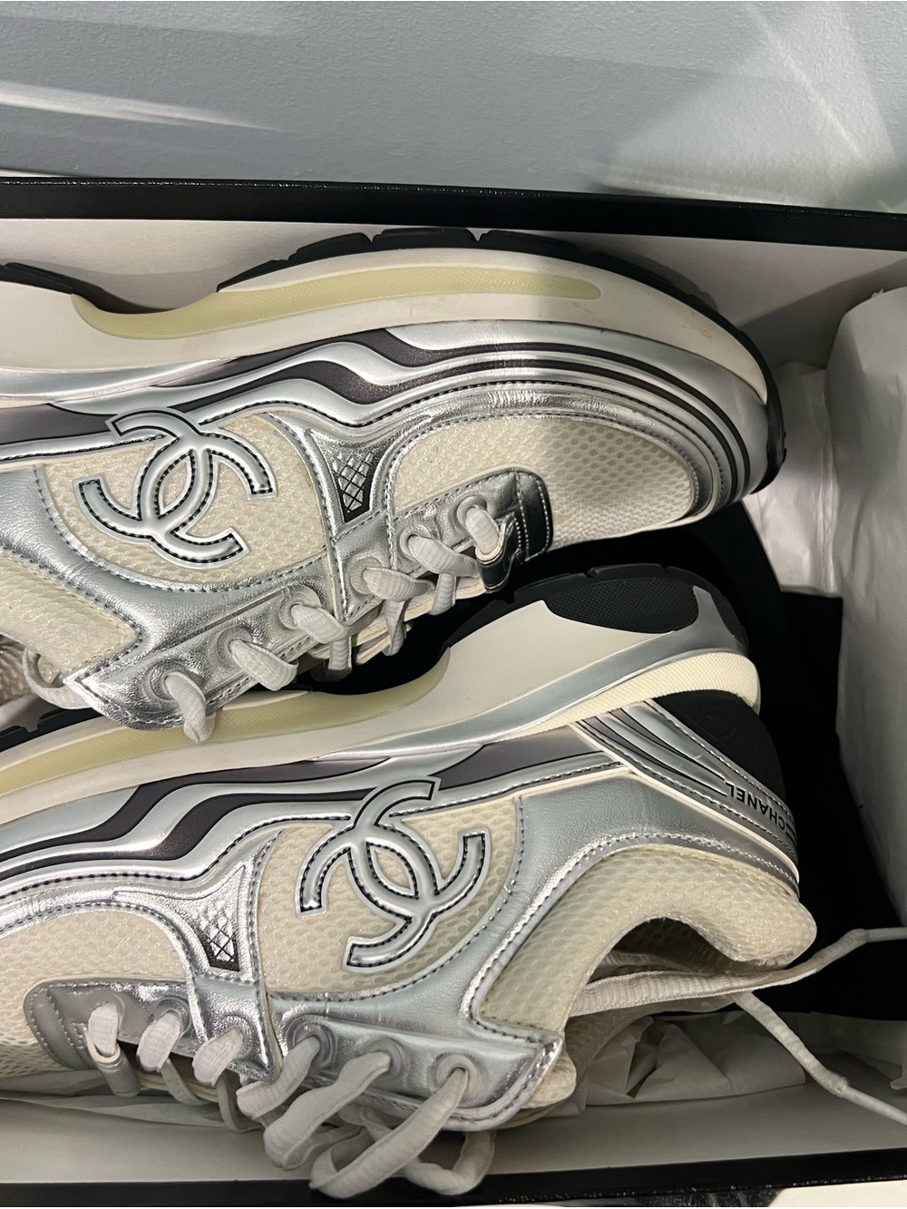 CHANEL Silver and White Wave-Detail Sneakers
